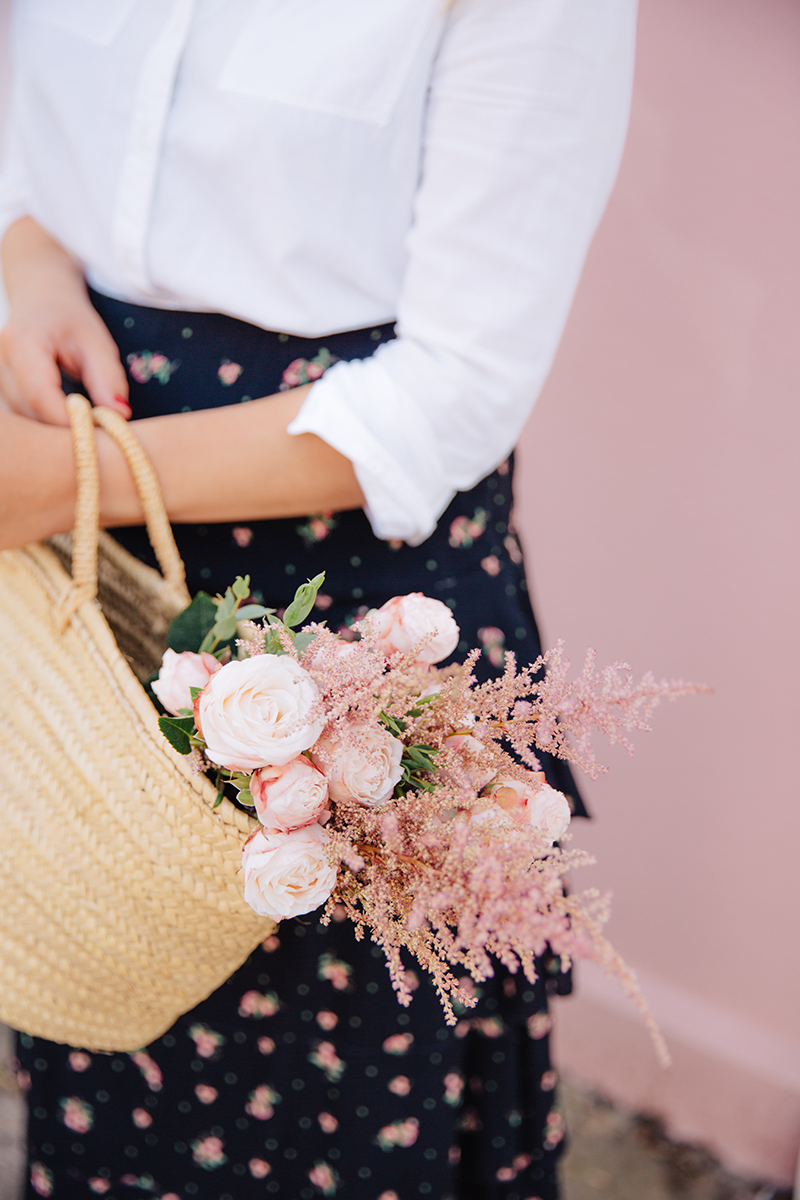 Beautiful Blush Pink Flowers In A Straw Basket Bag | The Elgin Avenue Blog