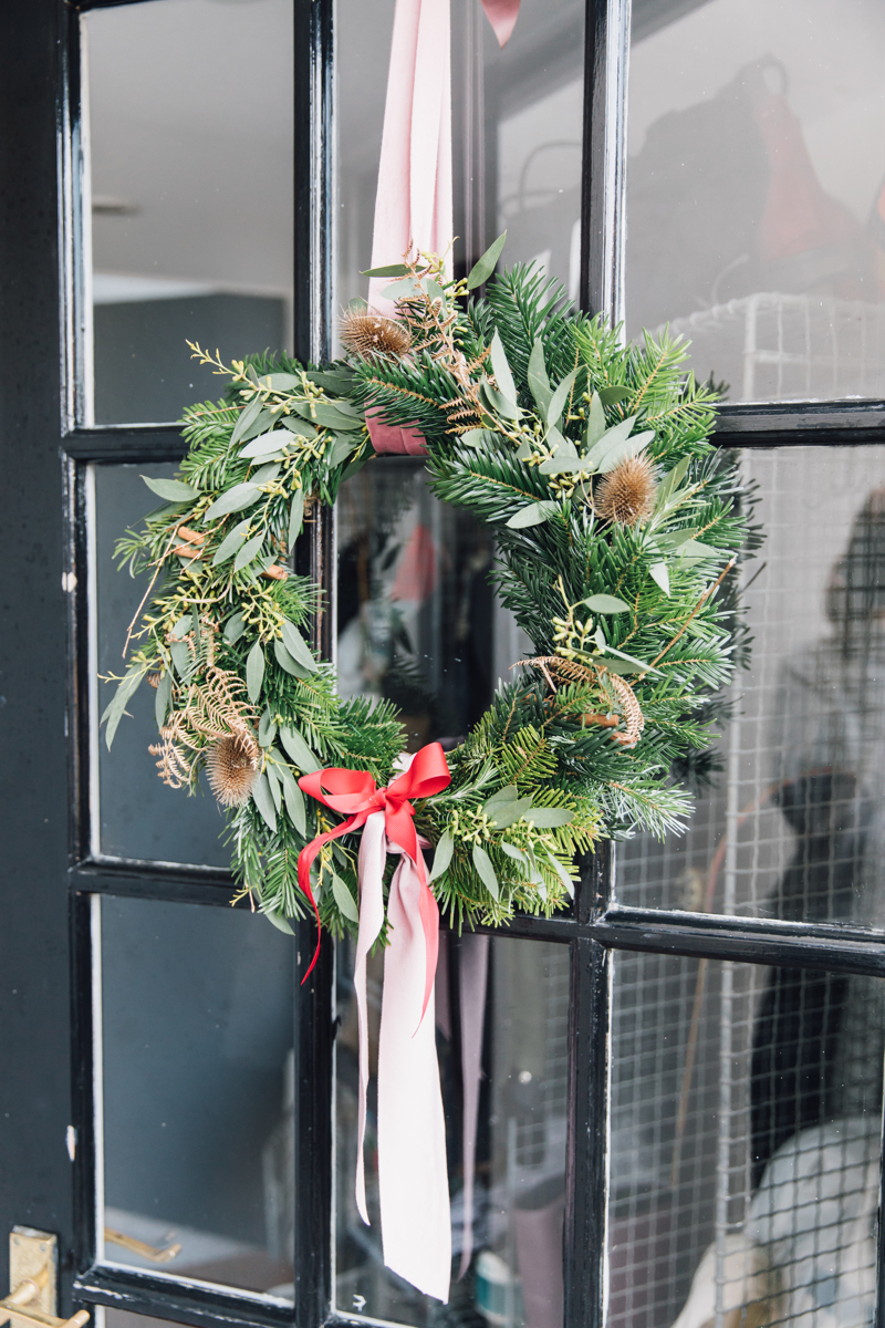 DIY Christmas Wreath With Pink And Red Bow | The Elgin Avenue Blog