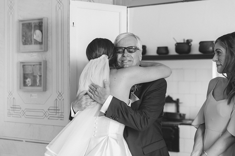 Father embracing daughter on her wedding day | Monica Beatrice Welburn wedding day Menorca